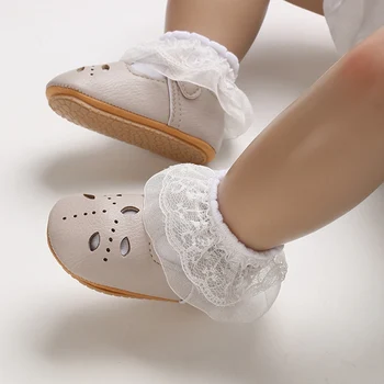 Яркие детские разноцветные кожаные туфли для первых шагов малышей